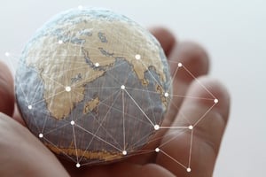 Earth in the palm of someone's hand